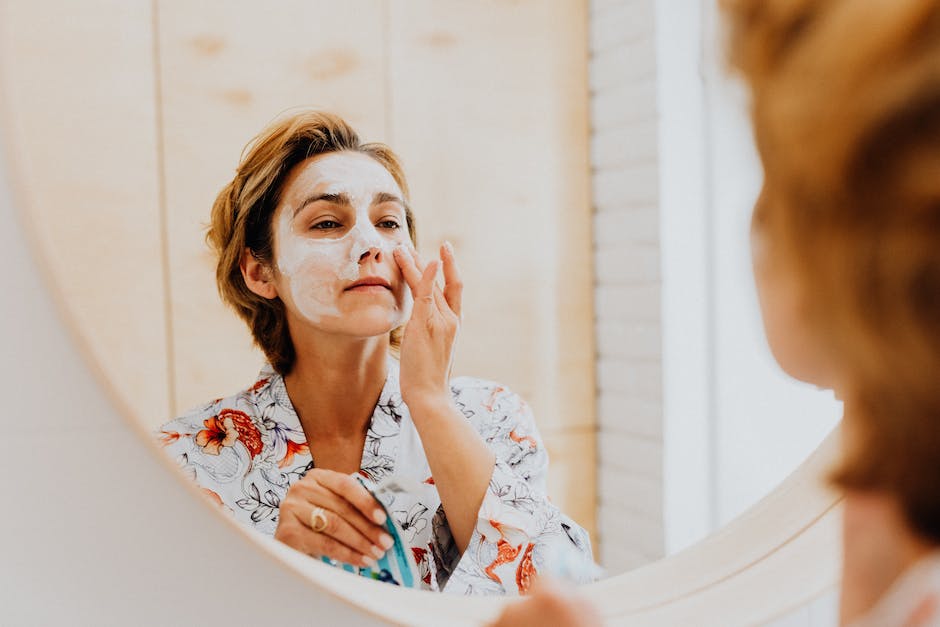 A celebrity getting a facial treatment to deep clean pores and exfoliate skin