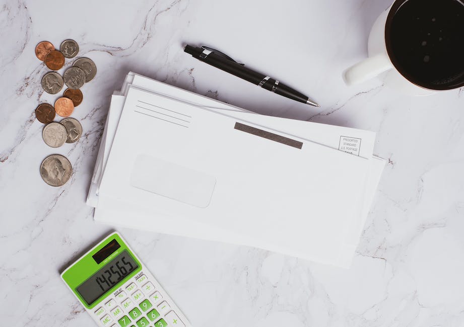 An image of a calculator and coins representing understanding inflation